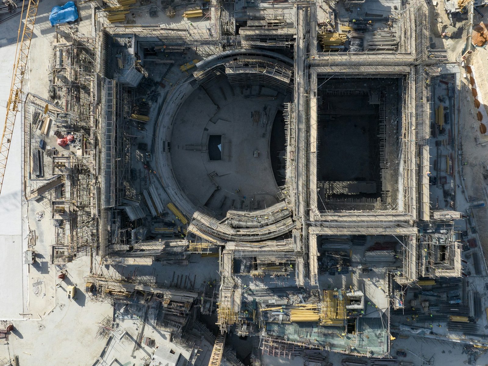 Top-down nadir aerial view of a housing development resembling a progress map or orthomosaic